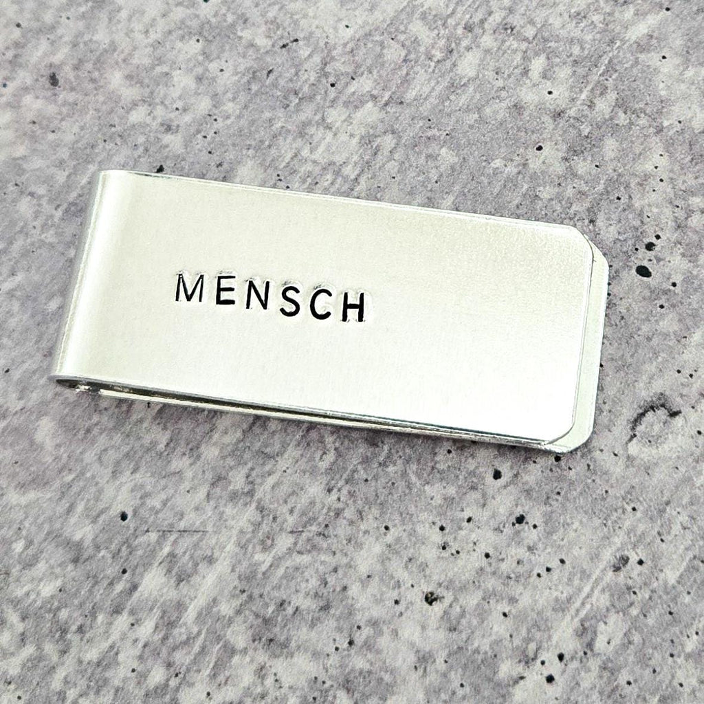 Mensch-Geldklammer